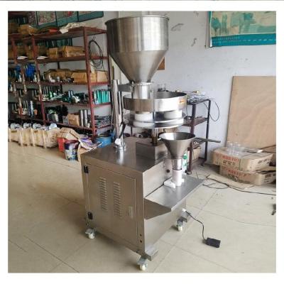 China Granule Packing Machinery Used Rice Granules Quantitive Weighing Scale Pellet Package Packing Machine for sale