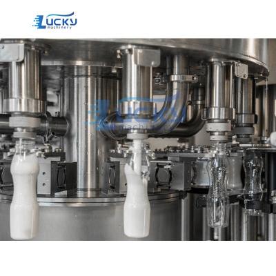 China Food PE HDPE Bottle Milk Capping and Filling Labeling Machine for sale