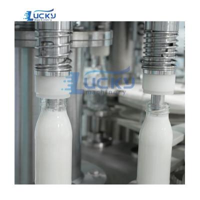 China Automatic food glass bottle milk yogurt filling machine for sale