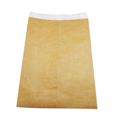 China Waterproof Shipping Mailing Tyvek Paper 230*324mm Brown Envelope With Seal And Chime Recycled Envelopes for sale