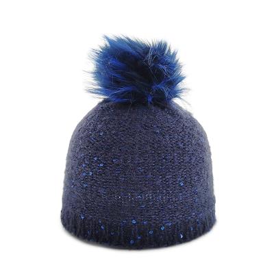 China COMMON hat warm knit hats for adult winter sequins gossip fashion style beanie with faux fur pom pon for sale