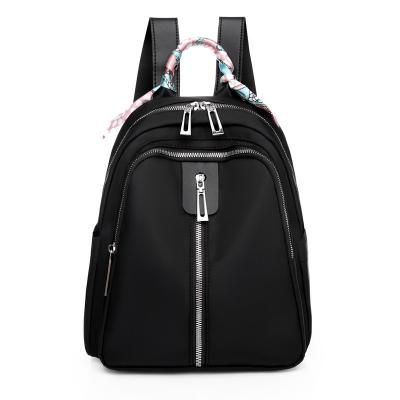 China New multifunctional backpack women's fashion schoolbag college students leisure traveling solid color canvas backpack wholesale for sale