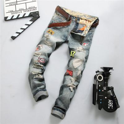 China Breathable straight leg men's jeans men's wear thin worn fabric holes of the badge ripped thin men's jeans pants for sale