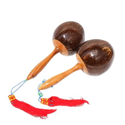 China Natural Coconut Shells Amazon Hot Selling Professionally Manufactured Manual Painted Children's Wooden Toy Musical Instrument for sale