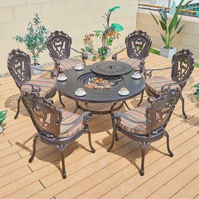 China Water Proof Popular exterior beach furniture round patio dining set garden cast aluminum BBQ table and 6 chairs for sale