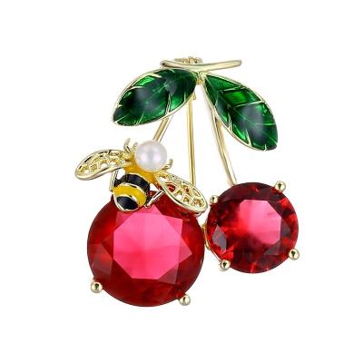 China Copper Red Zircon Cherry Brooch 2022 New Elegant Women Pin Fresh Simple Clip For Necklace Fruit Enamel Bee for sale