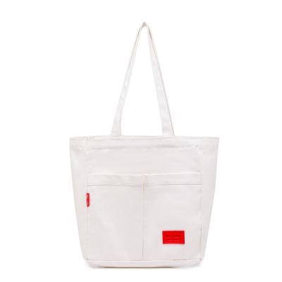 China New Water Proof Large Capacity Canvas Bag Student Shopping Bag One Shoulder Tote Bag for sale