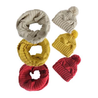 China Medium Directly Constructed Newly Knitted Cable Women's Warm Pompom Beanie Hat And Snood Costumes for sale