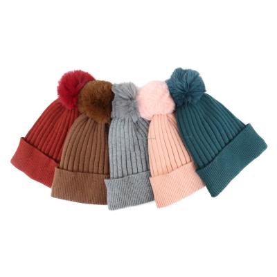 China 2021 Winter Style Custom New Fashion COMMON Hot Women Knitted Beanie Big Pom Pom Hat for sale