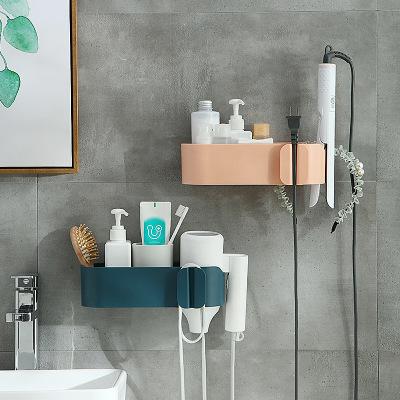 China Sustainable Bathroom Shelves Storage Box Hook Self Adhesive Seamless Cosmetic Organizer Hair Dryer Shelf for sale