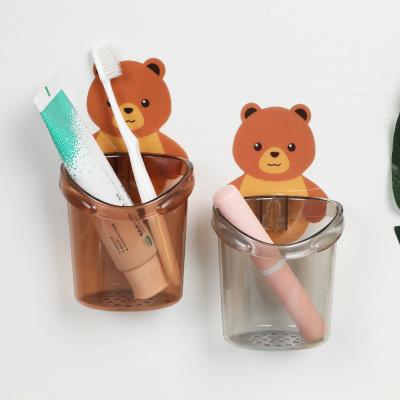 China Bear Hug Holder Cup Bathroom Toothbrush Drain Stocked Brushing Cup Toothpaste Punch Free Holder for sale