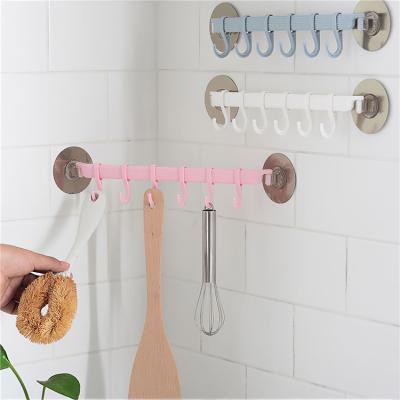 China 6 Hook Modern Adhesive Non-Marking Kitchen and Bathroom Plastic Rotating Hooks for sale