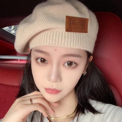 China New winter beret hat JOINT street style hat patch knitted woolen hat for sale