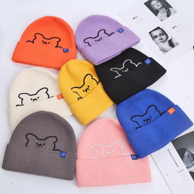 China New Style Hearing Protection Wool Cap Bear Embroidery COMMON Knitted Warm Hat for sale