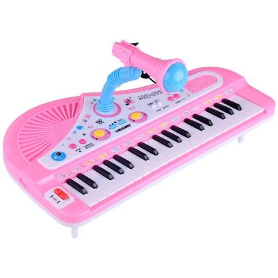 China Toyard Children Musical Instrument 37-Key Battery Operated Electronic Piano with Microphone Baby Music Multifunctional Piano Toy For Kids for sale