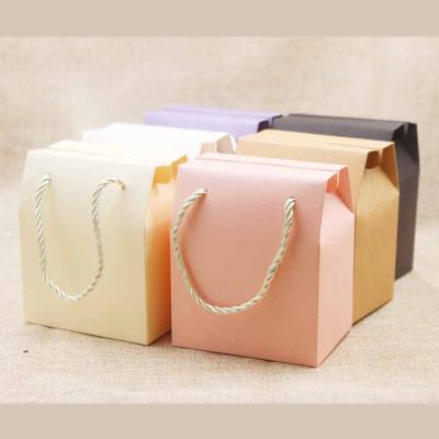 China Portable Candy Gift Boxes Plain Diy Cookies Chocolate Handle Box Small Recyclable Wedding White Baking Small Wicks for sale