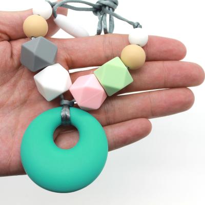 China Soft Toy Food Grade Silicone Baby Teething Beads Chewable Necklace Mommy Care Baby Teether Pendant Necklace for sale