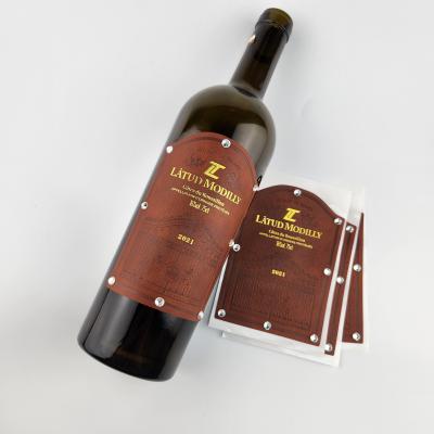 China Etiquetas de logotipo de cuero de PU con textura y sensación Etiquetas de etiqueta de vino personalizadas Etiquetas de cuero hechas a mano en venta