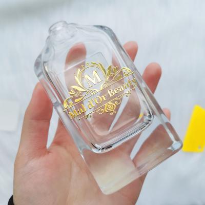 Chine Emballage de parfums Logo personnalisé Étiquette de bouteille de parfums estampage à chaud Autocollants transparents pour bougies à vendre