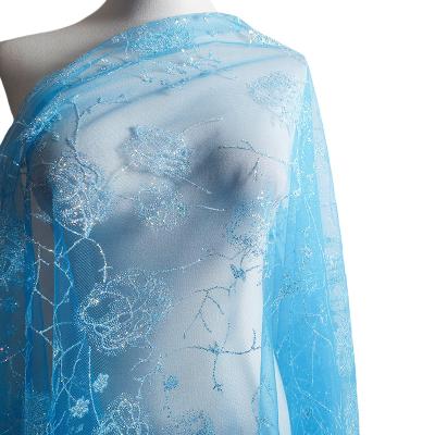 China Princess Elsa Glitter Flower Pattern Frozen Metallic Blue Frozen Fabric Shine Icy Pink Mesh For Halloween for sale