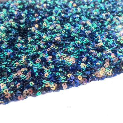 China Metallic Blue Holographic 3mm Sequin Foam Embroidery Sequin Fabric On Poly Spandex Mesh for sale