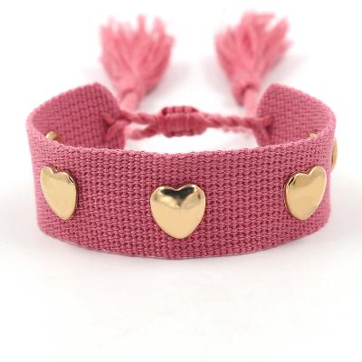 China Ethnic BOHEMIA Bracelet Gold Heart Shaped Metal Rivets Strap Bracelet Color Tassel Adjustable Size Bracelets for sale