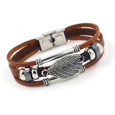 China Wholesale BOHEMIA Customization Brown Leather Alloy Leaf Multilayer Beaded Bracelets Stainless Steel Buckle Charm Bracelets for sale