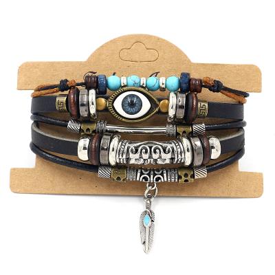 China FASHIONABLE Adjustable Handmade Multilayer Eye Leather Braided Bracelets For Men Women Beads Feather Cuff Bracelet for sale