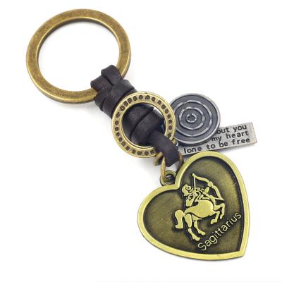 China Fashion/punk/alloy 12 hand-woven constellation vintage personality creative genuine leather spot key chain heart-shaped pendant key ring for sale