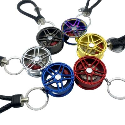 China Luxury Metal Key Chain Tire Ring Auto Modification Parts Keychain Key Chain Zinc Alloy Tire Rope Gift Lilangda Metal Wheel Hub Car Key for sale