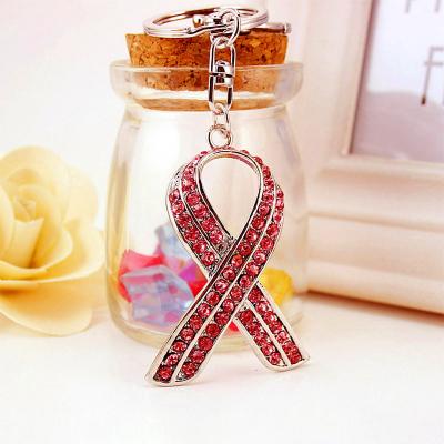 China Breast Cancer Awareness Lilangda 2022 Ribbon News Bag Accessories Small Key Chain Gift Key Chain Red AIDS Decoration Gift Women Key Chain for sale