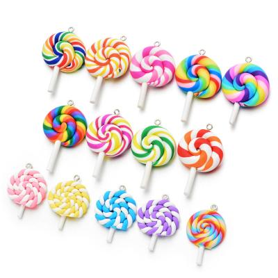 China Lilangda DIY Accessories Clay Rainbow Hard Candy Lollipop Rainbow Swirl Rubber Key Chain Soft Sucker On A Stick Designer Keychain Charms for sale