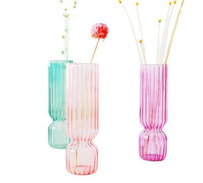 China Retro Home Vase Morandi Hydroponic Polishing Glass Vase Traditional Creative Colorful Glass Hydroponic Flower Arrangement In Decoration for sale