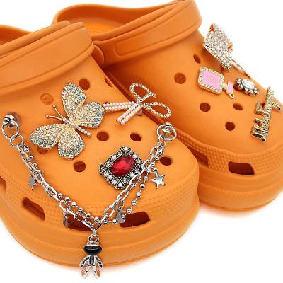 China The shoe light croc charms 2021 latest designer croc metal chain charms with bling croc charms for sale