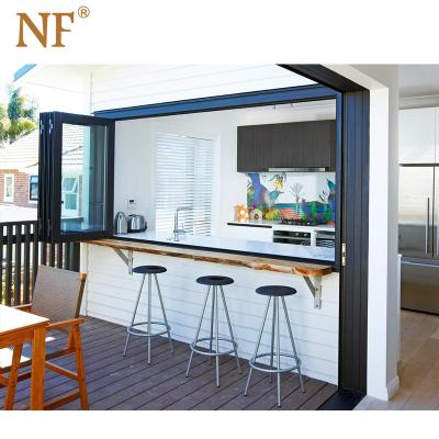 China Magnetic Screen Top Hung Aluminum Bifolding Window And Door for sale