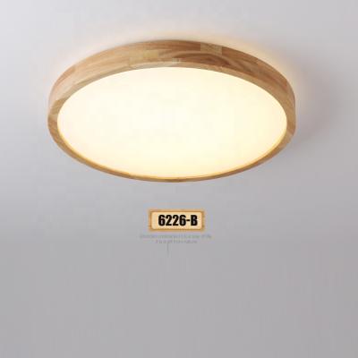 China Living room light color exterior mounted changeable wood baseceiling acrylic round led ceiling lamp for sale