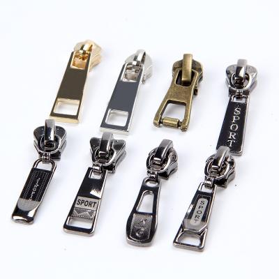 China Nickel Free Multiple Styles Zipper Pull Tabs Zipper Slider Wholesale 3 5 8 Custom Logo Zip Puller Metal Slider Zipper Puller Custom Logo for sale