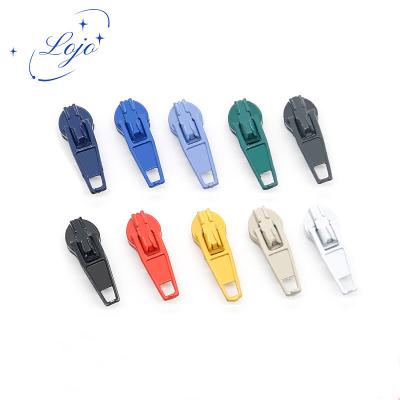 China Wholesale #3 Zipper Auto-Lock Nickel Free Zinc Alloy Nylon Head Painted Slider Puller With Thumb/Standard Puller For Jeans Clothes for sale