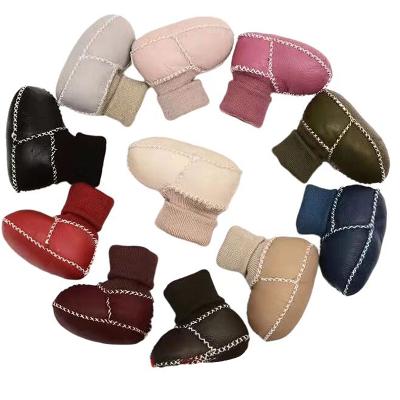 China Fashion Trend Thick Sheep Fur Shoes for Winter Baby Warmer Booties with Real Fur Kids Sheep Fur Striped Shoes for sale