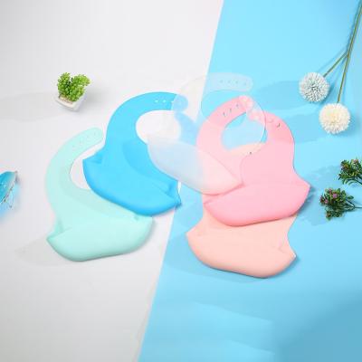 China BPA Free Soft Adjustable Fit Waterproof Silicone Baby Bib with Food Catcher, Baby Silicone Bib for sale