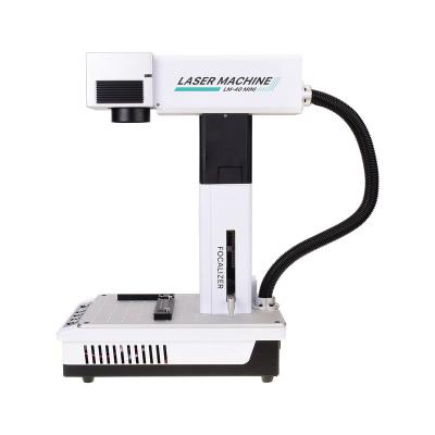 China REFOX LM-40 Mini Laser Marking Machine For iPhone Back Automated Loading Glass Remove Laser Engraving And Cutting Mobile Screen Glass for sale