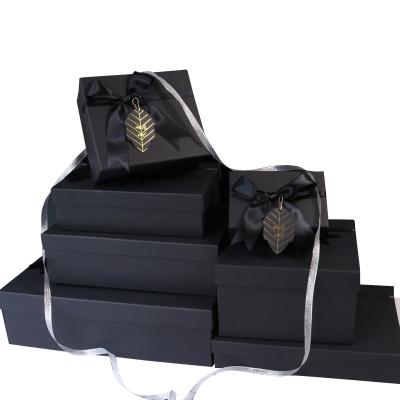 China Recyclable Hot Fancy Cardboard Storage Black Rigid Flat Luxury Folding Pink Gift Box With Ribbon for sale