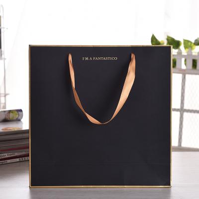 China Recycled Materials Wholesale Custom Logo With Colorful Reusable Kraft Paper Bags Eco-friendly Recyclable Gift Bag hotstamping gift for sale