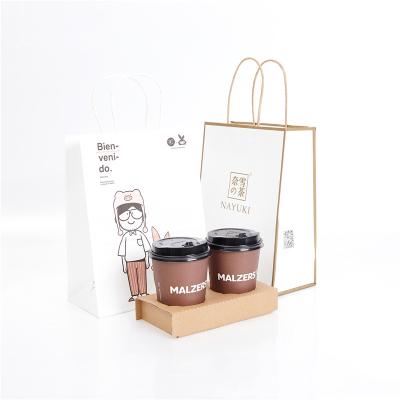 China Recycled Materials 2 Coffee Cup Hold Bag Branded Paper Bag Take Out Paper Bag for sale