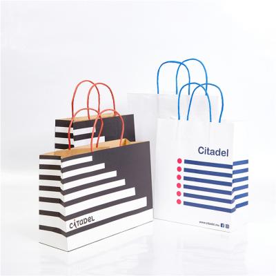 China Recycled Materials Clothing Brand Paper Bag Fashion Garment Paper Shopping Bag for sale