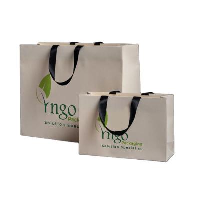 China Recycled materials custom paper bag with logo low MOQ bespoke printed paper bag eco paper bag for sale