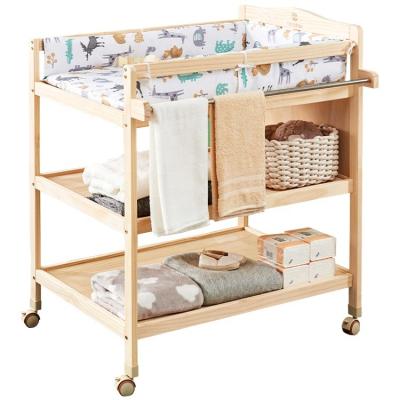 China Diaper Table Diaper Table Bath Massage Baby Multifunctional Touch Modern Solid Wood Dismountable Nursing Changing Table for sale