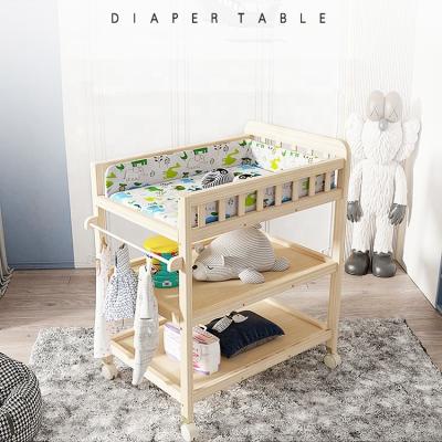 China Modern solid wood diaper table pine baby care table multifunctional newborn baby crib changing table for sale