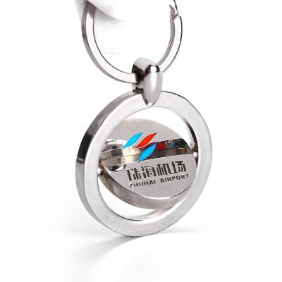 China Custom Blank Souvenir Lathe Spinning Key Chain Stainless Steel Round Shape Laser Key Chain for sale