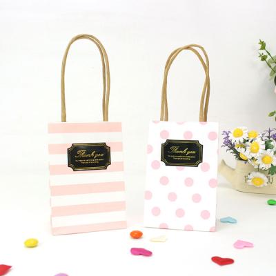 China Aseptic Pink Shopping Paper Gift Bags With Logo for sale